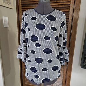 Super fun! Navy, polka dot blouse.